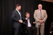 Sam Schmidt & Todd Davis present 2009 Partner for the Cure Award to Jim Oxley